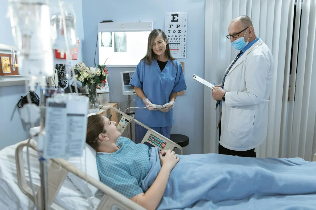 Doctor using a mental status exam template while writing notes on a hospital bedside clipboard